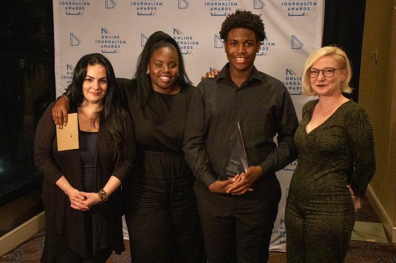 Jennifer Mascia, Akoto Ofori-Atta, Joshua Johnson and Sarah Whitmire pose for a picture in the red carpet area aftger receiving the Pro-Am Student Award in 2019. Photo by Daja Henry