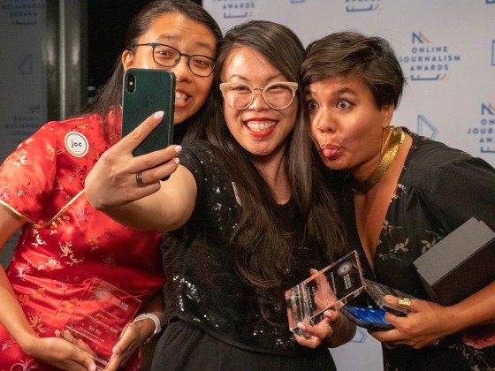 Sisi Wei, Julia B. Chan and Lam Thuy Vo make a selfie in the red carpet area after their team, Journalists of Color Slack Administrators, won the ONA Community Award at the 2019 Online Journalism Awards. Photo by Daja Henry